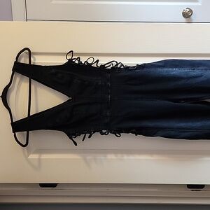 We The Free People black denim jumpsuit sz M cutouts lace-up v-neck flare